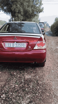 لانسر للبيع موديل 2011 سنويه بسمي رقم بغداد مكينه وكير كفاله حداديه كف...