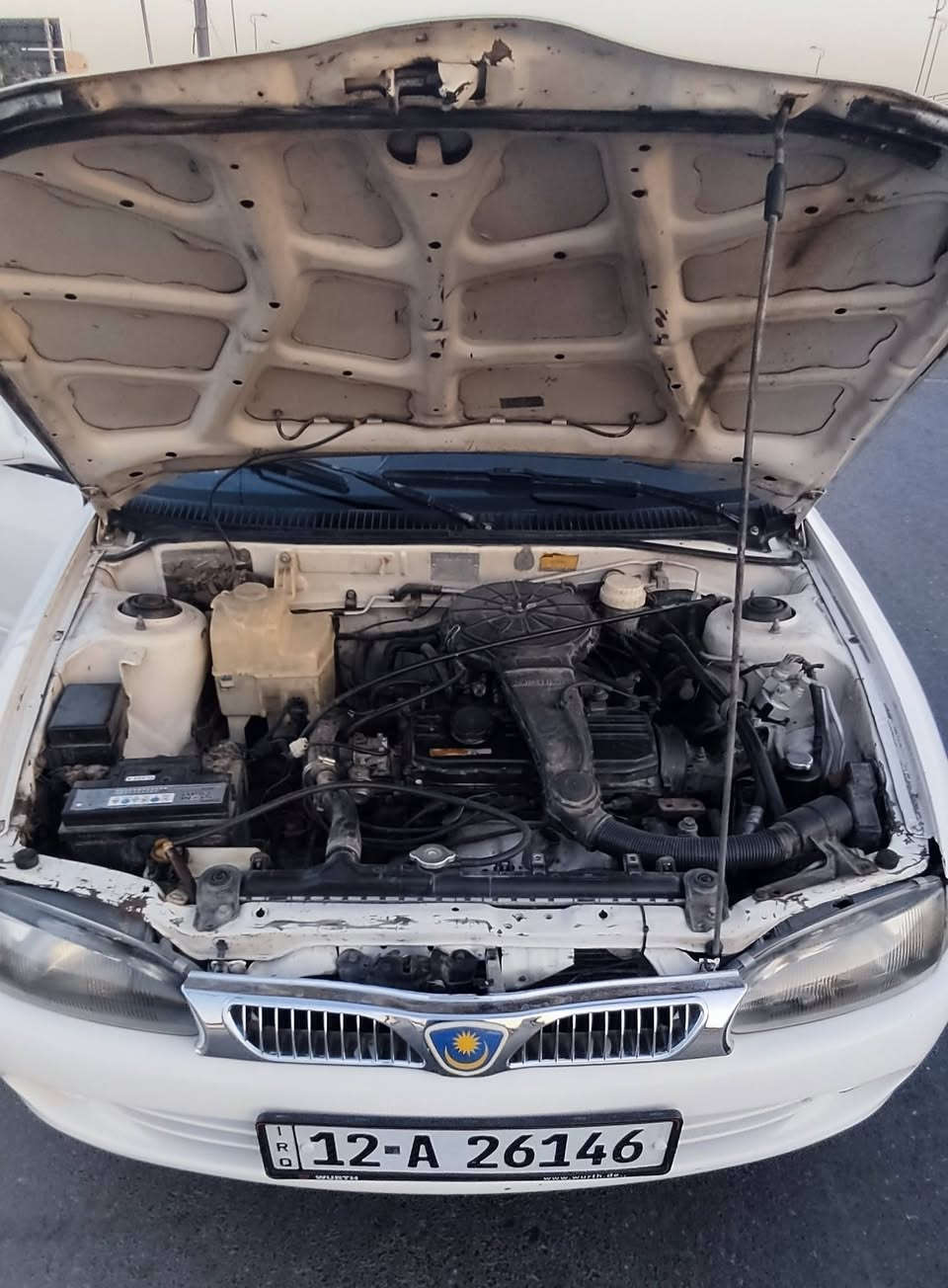 بروتون موديل 2002 للبيع (كير عادي)
​النوع: بروتون (Proton)
​الموديل: 2002
​المنظومة: كير عادي (عادي)
​اللون: أبيض
​البودي: صبغ حزم للجمالية (بدون دواخل، الدواخل سليمة تماماً).
​الأضرار: تبديل جاملغ سكن (أمامي) شغل مؤسسة.
​التبريد: شغال.
​الكهربائيات: شغال الكل، ما بيها أي نقص كهربائي.
​الميكانيك: كير ومحرك بشرط الفحص والجاهزية.
​التواير: طخم تاير جديد.
​الأوراق والتحويل: السنوية نافذة لغاية 2028، السيارة باسمي والتحويل بشرط.
​الإضافات: كوبون البانزين الإلكتروني جاهز وموجود مع السيارة.
​السعر: [ 38 ] وبيه مجال للشراي الطيب.
​المكان: نينوى / حي المطاحن الجانب الايمن 
​للاتصال والاستفسار: ***********
