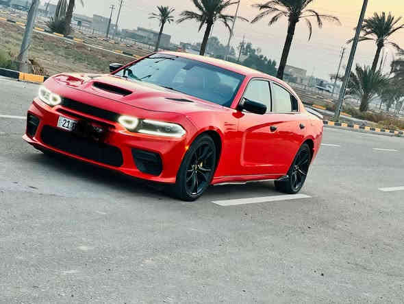 جارجر 2022  اصل ماشيه٥٠ الف حقيقي رقم سليمانيه بااسمي صور الضرر مرفقه بالمنشور فقط بنيد بدون دواخل عالفحص ابيعك وباامريكا بيها باب وجاملغ كلير وارجع واكول كلير فقط ومسؤول على كلامي بدون فتح بدون معجون بدون حادث فقط كلير السيارة جديدة بمعنى الكلمة استخدام شخصي 
داخلها لون احمر 

سياره جديده بمعنى الكلمه

المحرك : V6.  3.6L .

المواصفات :

* جناح خلفي بلادي
* ويل قياس 20 انچ  بلادي تخم تاير جديد
* ستيرن رياضي . 
مقاعد رياضية جلد   . 
* مصابيح أمامية زنون . 
* كشافات الضباب زنون . 
* المصابيح الأمامية مع LED . 
* حساسات . 
* شاشه كبيرة مع نظام ملاحة نفكيشن GPS .
* الشاشة مع اوپشنات SRT . 
* سستم صوت الپاين .
* مقاعد أمامية كهربائية عدد 1 
* مقاعد أمامية وتدفئة . 
* تشغيل عن بعد . *
* محدد سرعة . 
* تلفون بلوتوث . 
* كاميرا خلفية .
* مرايا متحسسة للاضاءة العالية .
* كير شفتر بالستيرن .
السيارة معروضه 218 $وبيها مجال بسيط الشراي يتصل وعيوني اله
***********
