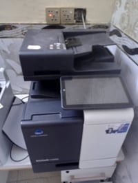 طابعة كونيكا بزهاب الاصدار الحديث طابعة ليزرية مواصفاته تكدر تكتب اسمه...