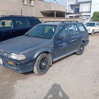 مازدا 323 • رقم كركوك • بدون ضربه