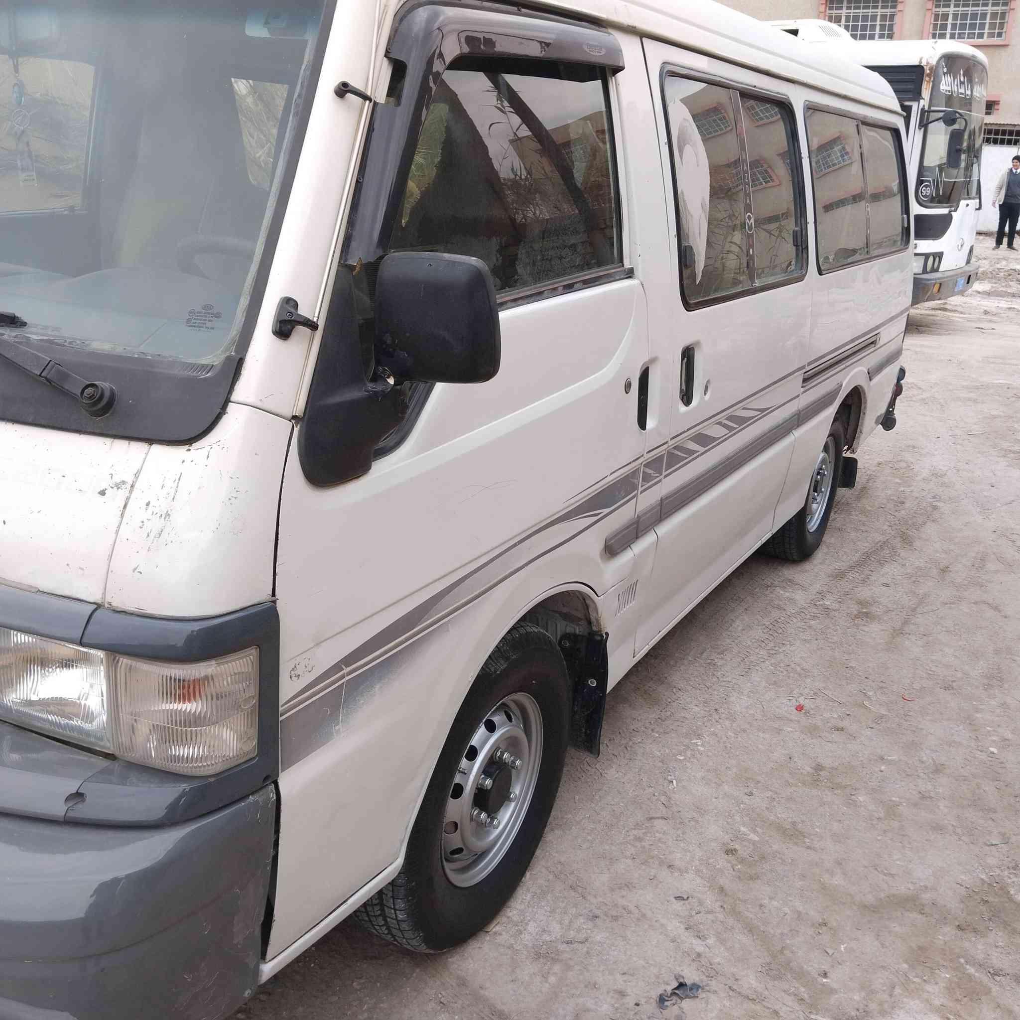 مازدا ٢٠٠٧جاهزه بفظل الله من كلشي مراوس ترهم معه الفرق رقم دولي بسمي ***********
