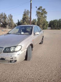 نيسان سني موديل 2006 محرك1.6 قبق اسود  وكير عادي مكفولات  رقم بابل بسم...