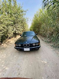 بي ام دبليو موديل 1992لون اسود غير محدد الحجم 735السياره رقم صلاح الدي...