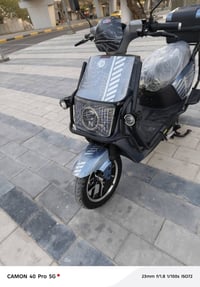 دراجه شحن جديدة 2026 زيرو 6 بطارية كبيره ملف 2000  البيع عنوان بغداد س...