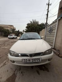 بروتون 2004 السياره خير من الله ما بيها اي نقص  كامله  محرك تدفئه تبري...