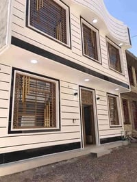 كربلاء حي الزهراء • بيت طابقين • ٥٤م