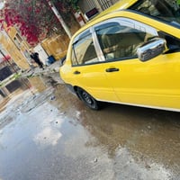 لانسر الون نيلي مصبوغ اصفر  سيارة جاهزة محرك كير اوتماتيك صدرخلفي امام...