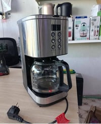 عندي ماكنة قهوا بهذا الشكل التفيده ب 15سعرها  07731441348