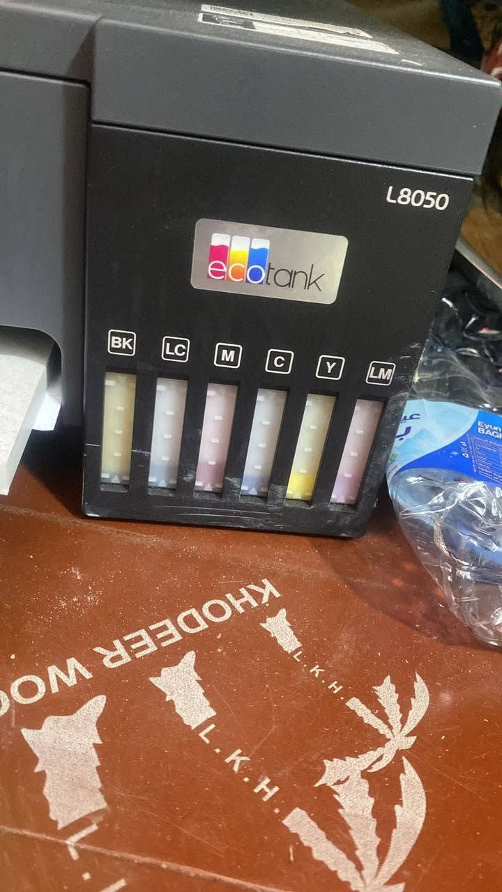 طابعةايبسون محورDTF+مكبس حراري للبيع الطابعة تطبع على ملابس السعر 650وبيهن مجال بسيط مكاني بغداد الدورة ***********
