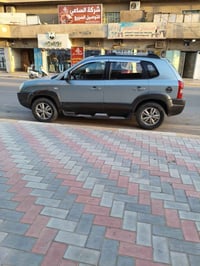 توكسان 2009 للبيع  محرك 2000 دوش  محرك وكير مكفولات  تبريد ثلج  صدر مب...