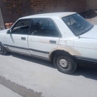 سيدان • محرك ٢ ونص • رقم إنكليزي