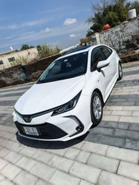 تويوتا كورولا هايبرد  موديل 2025 خليجي   مكفولة كفالة عامه من كلشي  فو...