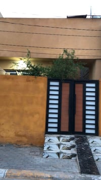 كربلاء العسكري • ١١٠م • واجهة ٥ ونص