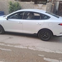 بي واي دي كن بلاس ابيض وداخل زيتوني مرقم بغداد جديد ماشية الفين و700وك...