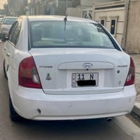 عندي دعامية خلفيه مال اكسنت موديل 10 مثل مموضحه بلصوره قيم وخذ التفيده...