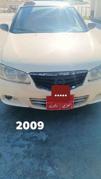 بوو فروتني تكسي نيسان صني 2009 07508940826