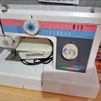 وبركاته ورحمة مكينة خياطه أخت الجديده مع الاستاند مالتها07707744246