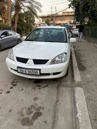 لانسر ٢٠٠٩ • مشي ١٩٠الف • منظومة غاز