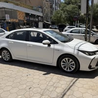 كورلا هايبرد ٢٠٢٤ رقم سليمانية علامة زركة باب الأول ماشية 57 بيه طخة ب...