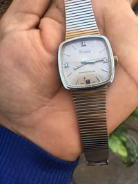 ساعة • سويسري • تكويك