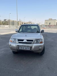 باجيرو 2003 مصبوغه حزام ماعدى الباب الخلفي السيارة بدون حادث الصبغ جما...