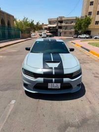 جارجر موديل 2022 SXT لون سموك حادثه جاملغ الامامي والباب بدون دواخل سي...