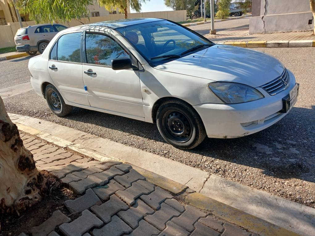 لانسر٢٠٠٧كيرعادى عام بوياغه ليدرانى قورسى نيه كيرمكينه تبريد تحويل به شه رت مكينه كه ميك بوخارى هه يه سه نه وى به سه ر جوه نرخ60ورقه *********** شقلاوة, أربيل
