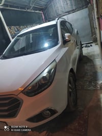 توسان موديل 2014رقم بغداد بسمي محرك 2000دوش ماشيه 163(السعر ١٣٥$للستفس...