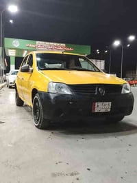 رينو موديل 2009 جديده رقم بغداد لون اصفر تايرات و صدر جدد محرك مبدل جد...