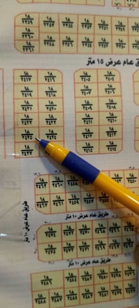 قطعة أرض • حي 18 • 100م