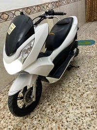 دراجه pCX جديده مال رمبه ياباني نوزل خطين ستان كهربائي مكينه ناعمه شلع...