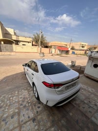 للبيع كورلا 2021 LE محسن يعني فول سعر 163 07703044323