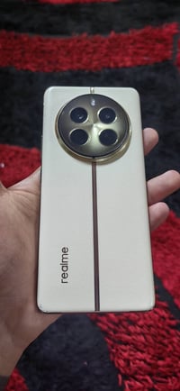 ريلمي 12 برو بلس ذاكرة 512 بي طختين موضحة بلصورة فقط بل اطار مماثرة   ...