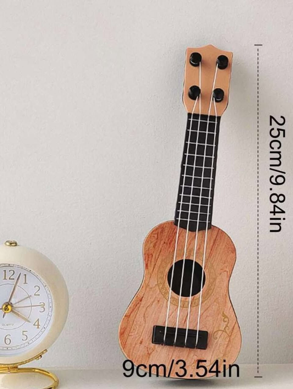 ✨ غيتار ديكوري صغير – لمسة فنية بأي مكان ✨
تحب الديكور المختلف؟
هذا الغيتار الصغير يضيف جو موسيقي أنيق لغرفتك 🎶

🔹 حجمه صغير وخفيف
🔹 مثالي للديكور: غرف النوم، المكاتب، الرفوف
🔹 تصميم خشبي جميل يلفت النظر
🔹 هدية حلوة لعشّاق الموسيقى 🎁

💰 السعر: 8,000 دينار مع التوصيل لجميع المحافظات 
🚚 التوصيل متوفر لكل المحافظات
#إكسبلور #العراق #امزون


**إذا كنت صاحب هذا الإعلان وتريد حذفه لأي سبب، رجاءا أرسل رسالة إلى الدعم الفني**