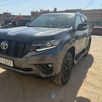 برادو TXS • ٢٥٠٠٠ كم • رقم بغداد