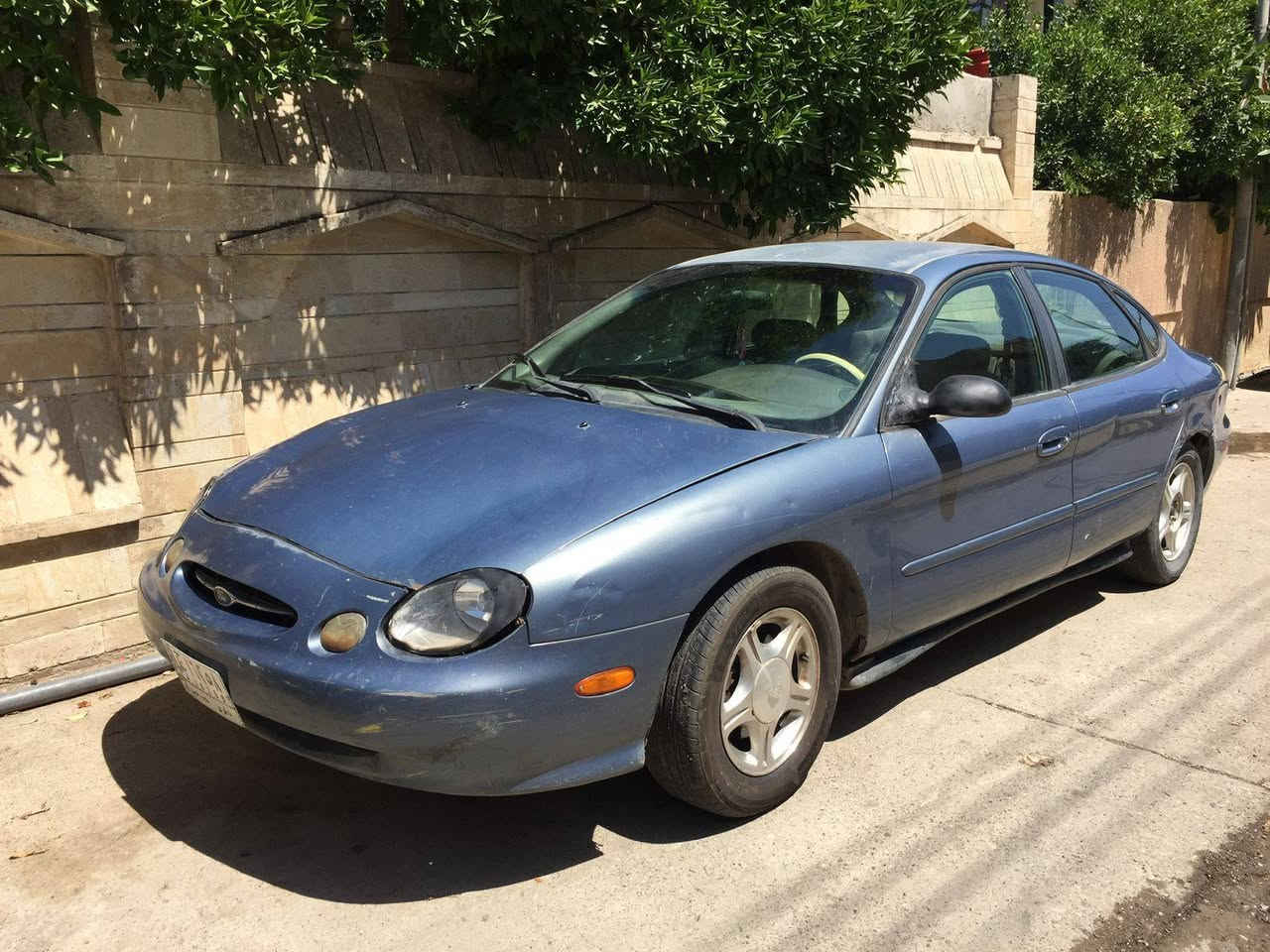 للبيع فورد موديل ١٩٩٩السعر ١٤ وبيها مجال ***********السيارة الكير قيم البيع فحم كوبون بانزين
