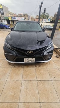 كامري ٢٠٢٣ دخول جديد مرقم بغداد ماشية ٧٣  الف السيارة  مواصفاتها مدروج...