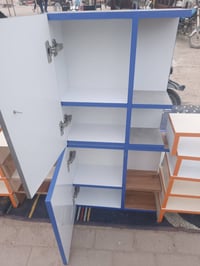 نجف • رفوف • قفس طيور