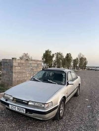 مازدة ٦٢٦ موديل ١٩٩٠ مةكينة ٨ بةخ گير عادي سةنوي٢٠٢٤بةسةر جوة كيرو مةك...