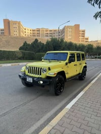 jeep wrangler sahara 4*E plugin hybrid مۆدێل ٢٠٢٣  38,000mile ڕۆشتووە ...