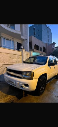 ترابلایزەر 2002 سەیارەکی زۆر خاوینە و گیرو مەکینە بەشەرتە حیجام نیە بە...