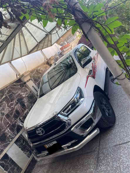 سلام عليكم للبيع تويوتا هايلوكس فور ويل 2024 بانزين كير اوتماتيك رقم اربيل بسمي ماشي 35 الف مكفولة كفالة عامة السيارة فول عدة البصمة شاشة كامرة مثبت سرعة تحكم جهتين لد امامي خلفي عنوان بغداد السعر 338$ وبيها مجال بسيط *********** بغداد
