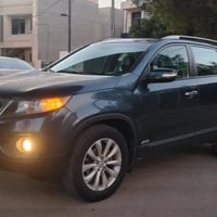 كيا سورنتو وارد امريكي رقم بغداد 2011 فول محرك 6 سلندر بصمه كامره تحكم...