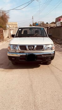 بيك اب نيسان دبل قمارة موديل 2000 رقم انكليزي مكينة جديده تبريد تدفئة ...