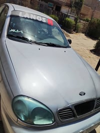 سيارة دايو لانوس موديل 2002كاملة هزة وسنوية رقم جديد مكانها بغداد ابو ...
