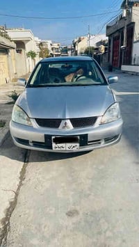 لانسر • ٢٠١٠ • فحص ٢٠٢٧