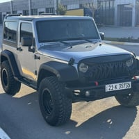 جيب رانكلر 2018 sport قطعتين و نص صبغ  4*4 شاشة كبيرة  ماشية 89 الف ما...