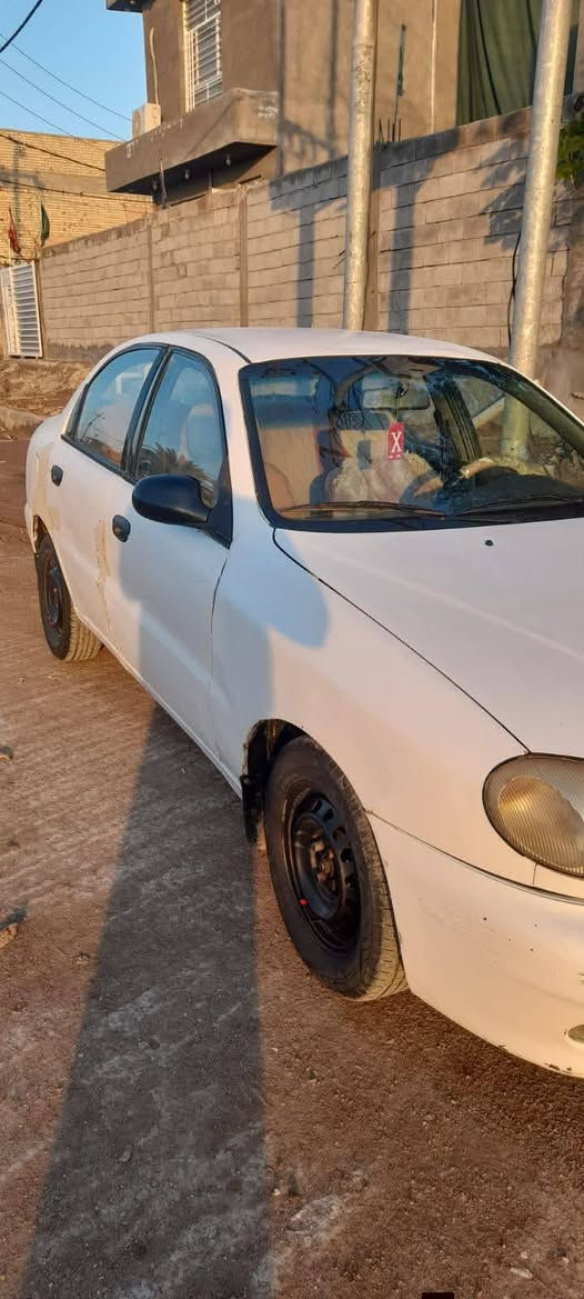 السلام عليكم  من رخصه مدير الاكروب المحترم دايو  لانوس موديل ٢٠٠٠  محرك ١٦٠٠  كير ومكينه مكفولات لا بخار ولا تنقيص  كير عادي  صدر جديد  تاير جديد  باتري جديد ما بيهه نقص  السعر ٣٥ وبيه مجال  سنوية لل ٢٠٢٧  رقم بغداد   عد صاحبهه الشرعي  عنوان واسط الزبيديه وهذا‏‪***********‬‏  ابو حيدر
