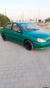 كيا ريو 2001 كير أوتو محرك وحداديه خير من الله ترايك وين ماتريد سعر 38...